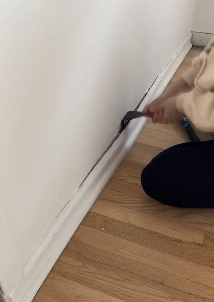 pulling trim off wall